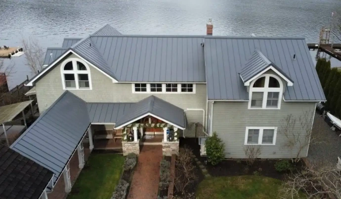 Screw-down seal roofing on home - metal protection against the elements